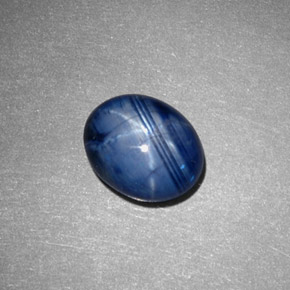 Safira estrela azul natural 3,71ct, corte oval, opaco