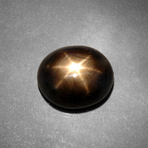 Safira estrela preto natural 7,46ct, corte oval, opaco