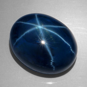 Safira estrela azul natural 62,28ct, corte oval, opaco