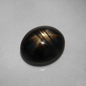 Safira estrela preto natural 10,73ct, corte oval, opaco