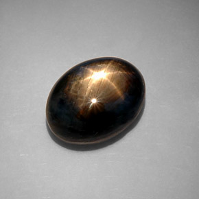 Safira estrela preto natural 10,65ct, corte oval, opaco