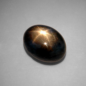 Safira estrela preto natural 10,65ct, corte oval, opaco