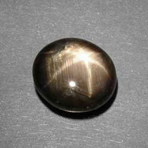 Safira estrela preto natural 5,82ct, corte oval, opaco