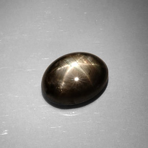 Safira estrela preto natural 6,59ct, corte oval, opaco