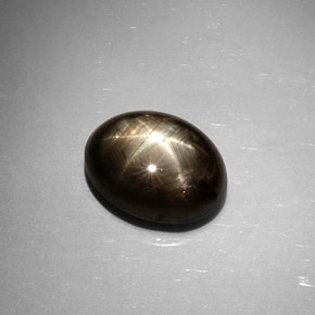 Safira estrela preto natural 6,59ct, corte oval, opaco