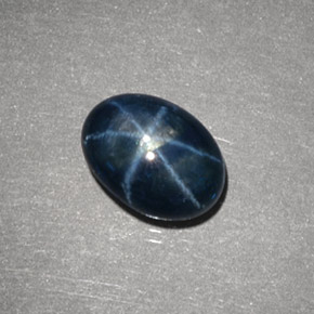 Safira estrela azul natural 2,31ct, corte oval, opaco