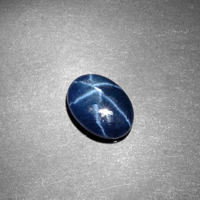 Safira estrela azul natural 1,35ct, corte oval, opaco
