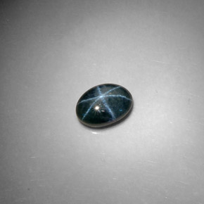 Safira estrela azul natural 2,59ct, corte oval, opaco