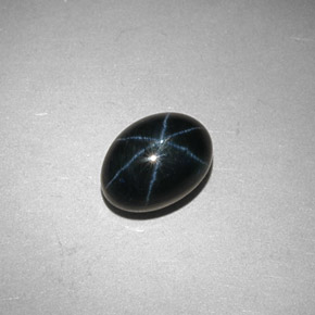 Safira estrela azul natural 2,44ct, corte oval, opaco