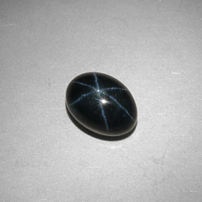 Safira estrela azul natural 2,44ct, corte oval, opaco