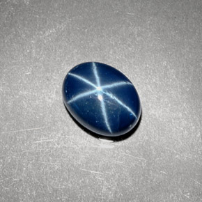 Safira estrela azul natural 2,10ct, corte oval, opaco