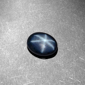 Safira estrela azul natural 1,44ct, corte oval, opaco