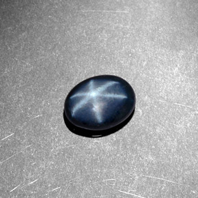 Safira estrela azul natural 1,44ct, corte oval, opaco