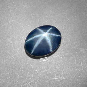 Safira estrela azul natural 1,30ct, corte oval, opaco