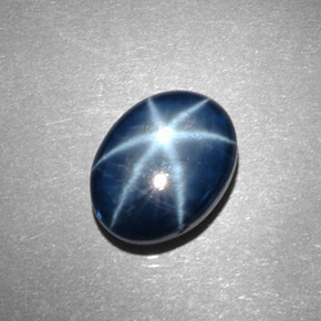 Safira estrela azul natural 5,64ct, corte oval, opaco