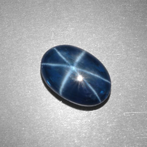Safira estrela azul natural 4,32ct, corte oval, opaco