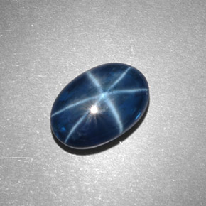 Safira estrela azul natural 4,32ct, corte oval, opaco