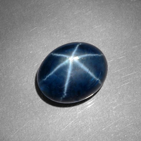 Safira estrela azul natural 8,60ct, corte oval, opaco