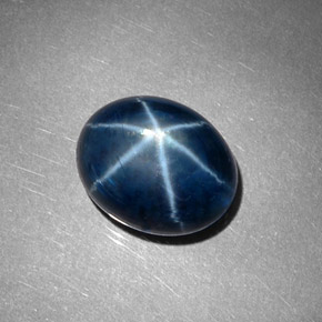 Safira estrela azul natural 8,60ct, corte oval, opaco