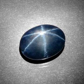 Safira estrela azul natural 5,63ct, corte oval, opaco