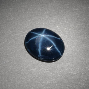 Safira estrela azul natural 2,90ct, corte oval, opaco