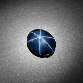 Safira estrela azul natural 4,06ct, corte oval, opaco