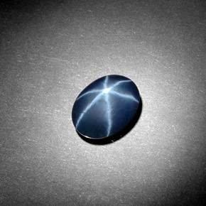 Safira estrela azul natural 2,91ct, corte oval, opaco