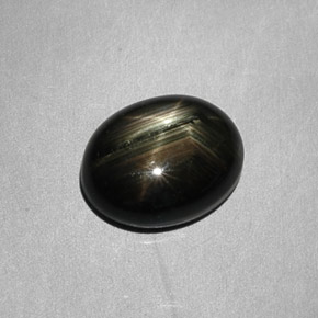 Safira estrela preto natural 6,26ct, corte oval, opaco