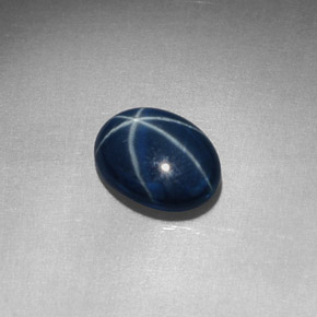 Safira estrela azul natural 1,52ct, corte oval, opaco