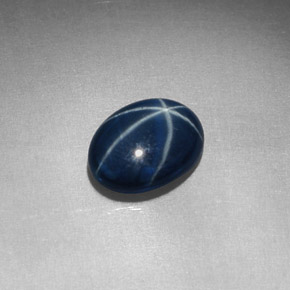 Safira estrela azul natural 1,52ct, corte oval, opaco