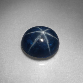 Safira estrela azul natural 2,32ct, corte oval, opaco