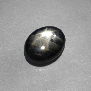 Safira estrela preto natural 1,98ct, corte oval, opaco