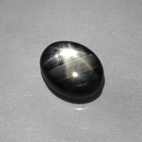 Safira estrela preto natural 1,98ct, corte oval, opaco