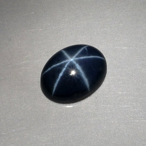 Safira estrela azul natural 1,52ct, corte oval, opaco
