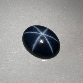 Safira estrela azul natural 1,52ct, corte oval, opaco