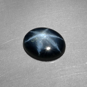 Safira estrela azul natural 1,56ct, corte oval, translúcido
