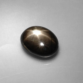 Safira estrela preto natural 1,75ct, corte oval, opaco