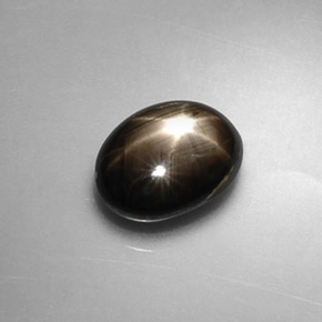 Safira estrela preto natural 1,75ct, corte oval, opaco