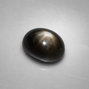 Safira estrela preto natural 2,48ct, corte oval, opaco
