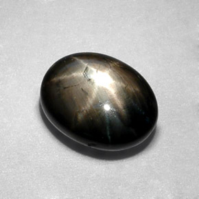 Safira estrela preto natural 2,30ct, corte oval, opaco
