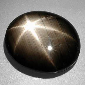Safira estrela preto natural 9,26ct, corte oval, opaco