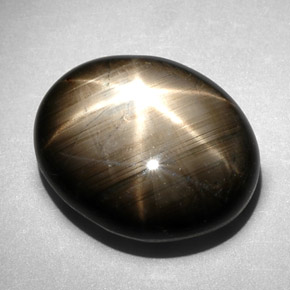 Safira estrela preto natural 10,83ct, corte oval, opaco