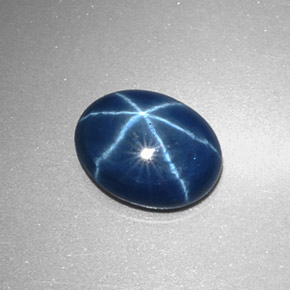 Safira estrela azul natural 2,34ct, corte oval, opaco