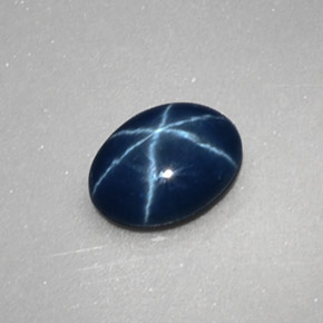 Safira estrela azul natural 1,04ct, corte oval, opaco