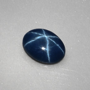 Safira estrela azul natural 1,04ct, corte oval, opaco