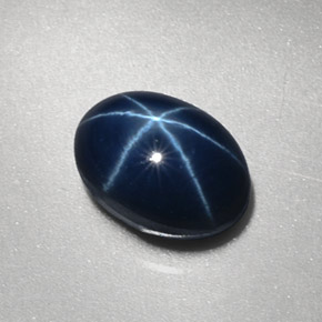 Safira estrela azul natural 3,17ct, corte oval, opaco