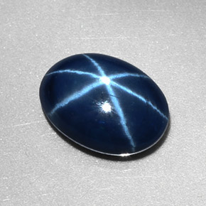 Safira estrela azul natural 2,57ct, corte oval, opaco