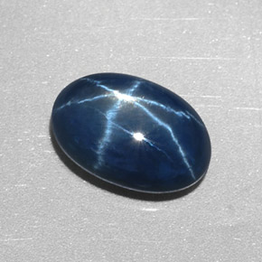 Safira estrela azul natural 2,55ct, corte oval, opaco