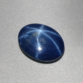 Safira estrela azul natural 1,48ct, corte oval, opaco