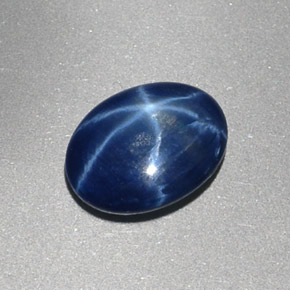 Safira estrela azul natural 1,48ct, corte oval, opaco